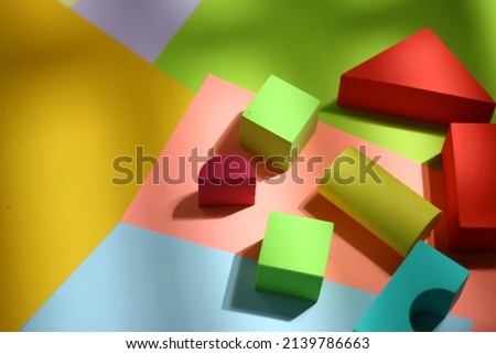 Sponge blocks colourful house shot from top. Kids toys blocks