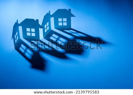 link of four complete paper house in blue light with shadow in concept of business and tech.