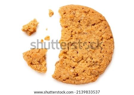 Broken stem ginger biscuit with crumbs isolated on white. Top view. Royalty-Free Stock Photo #2139833537