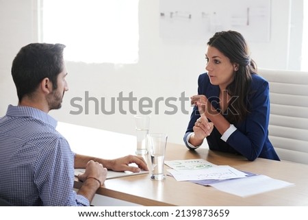 What distinguishes you from all the other candidates. Shot of a businesswoman interviewing a job applicant in an office. Royalty-Free Stock Photo #2139873659