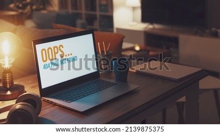 404 page not found error message on a laptop screen, network problem and broken link concept Royalty-Free Stock Photo #2139875375