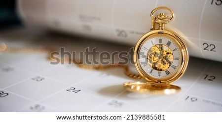 Pocket watch against a calendar concept for planning, scheduling, meeting or appointment Royalty-Free Stock Photo #2139885581