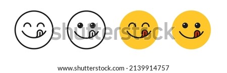 Yummy smile emoji with tongue lick mouth. Delicious tasty food symbol for social network. Yummy and hungry icon. Savory gourmet. Enjoy food sign. Vector illustration isolated on white background. Royalty-Free Stock Photo #2139914757
