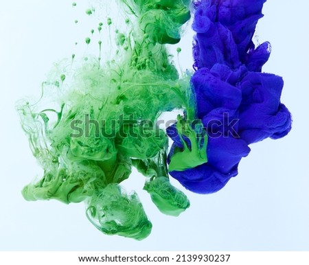 Abstract background with mixed colors paint splash over light gray backdrop