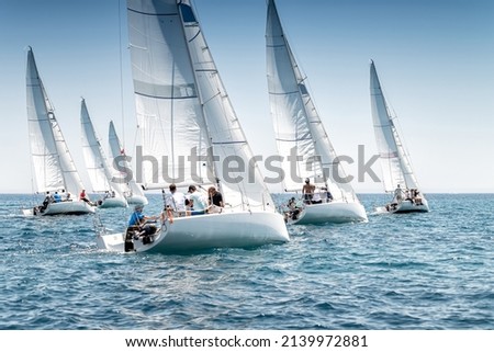 Sailing boats on the start line of regatta Royalty-Free Stock Photo #2139972881