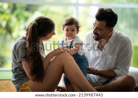 young mother and child baby are happy at home, childhood family concept with caucasian mom and little boy, newborn care lifestyle Royalty-Free Stock Photo #2139987443