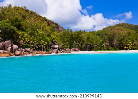 Tropical beach at island Praslin Seychelles - vacation background