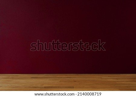 Dark red background for copy space and wooden table Royalty-Free Stock Photo #2140008719