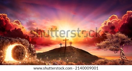 Resurrection - Crosses And Empty Tomb With Crucifixion At Sunrise - Abstract Defocused Lights Royalty-Free Stock Photo #2140009001
