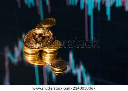 Bitcoin, High angle view of bitcoin and trade chart background concept idea copy space for text. Group of crypto money