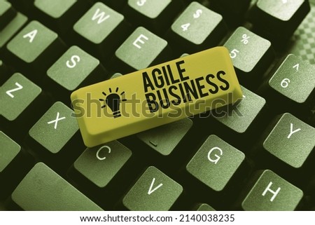 Hand writing sign Agile Business. Business approach capability of adjusting quickly to the market s is trend Typing Online Tourist Guidebook, Searching Internet Ideas And Designs