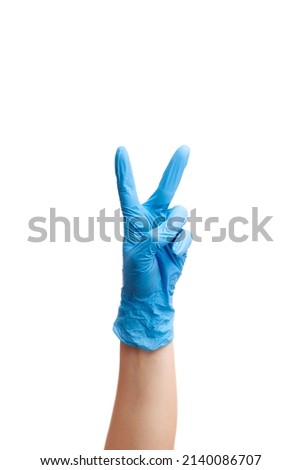 doctor showing 2 fingers hand gesture