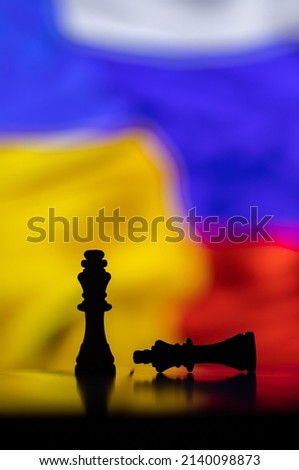 War between Russia and Ukraine, conceptual image of war using chess board, pieces and national flags on the background. Ukrainian and Russian crisis, political conflict. Stop the war 2022 Royalty-Free Stock Photo #2140098873