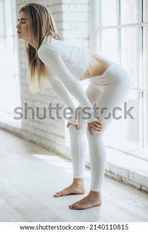 Yoga. Woman doing yoga in the studio. High quality photo