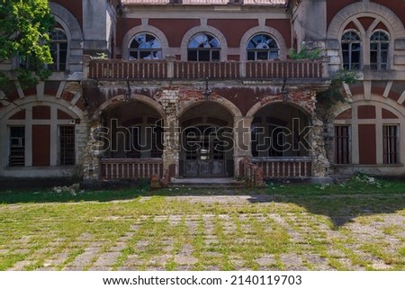 Abandoned, decaying historical heritage of the 19th century, an old ownerless estate. Background with copy space for text