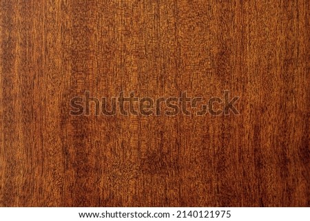 Lacquered wood. Blank background in full screen. Natural noble mahogany texture. Flat table surface. Royalty-Free Stock Photo #2140121975
