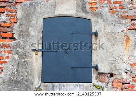 iron door on brick wall texture 