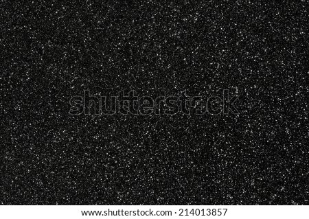 black glitter texture dark background Royalty-Free Stock Photo #214013857