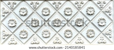 Elements of architectural decoration of buildings, plaster stucco, wall texture, plaster molding and patterns. High quality photo Royalty-Free Stock Photo #2140185841