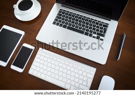 Quick and easy access to the world online. High angle shot of various digital devices on a table.