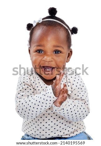 Let the games begin. Studio shot of an adorable baby girl isolated on white. Royalty-Free Stock Photo #2140195569