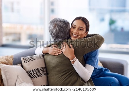 You will always be appreciated for your kindness. Shot of a young nurse hugging a senior woman. Royalty-Free Stock Photo #2140195689