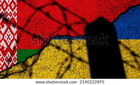 Belarus and Ukraine conflict and war. Flags painted on cracked concrete wall background photo