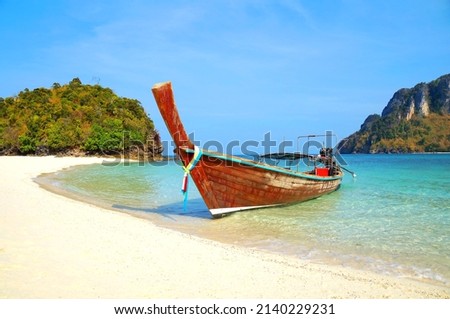 A wooden boat for cruising in the seas of southern Thailand in summer.