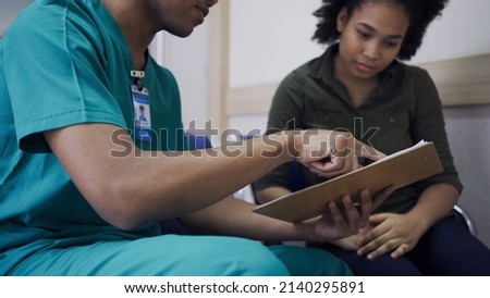 Doctor talk with a patient at hospital. Health and wellness. Royalty-Free Stock Photo #2140295891