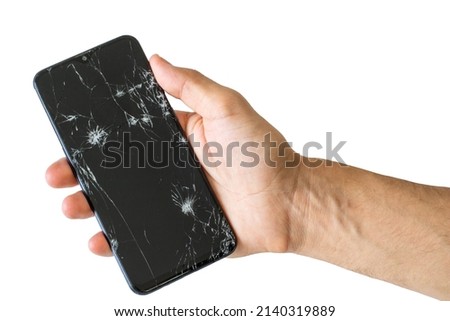 Phone with a broken screen on a white background. Broken phone in hand on white background