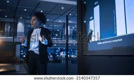 e-Business Technology Conference Presentation: Innovative Black Businesswoman Talks about Revolutionary High-Tech Product. Projector Screen Shows Graphs, Infographics, AI, Big Data, Machine Learning