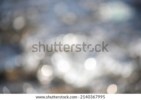 White bokeh, defocused, abstract background.