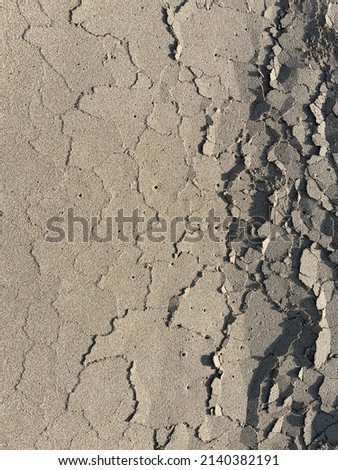 cracks in the ground abstract background, photography