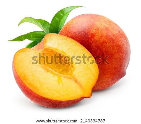Peach isolated. Whole peach with a half on white background. Peach fruit with leaf cut out. With clipping path. Full depth of field.
