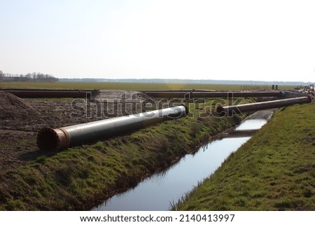 Construction of a pipeline in the Northern Netherlands (Europe). Sand is sucked up and moved with this pipeline.