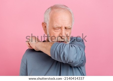 Photo of ill old white hairdo man sneeze wear blue shirt isolated on pink color background