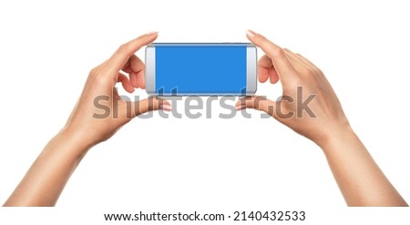 Female hands holding phone with blank screen isolated