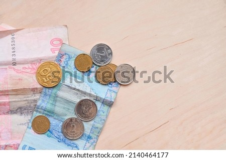 Ukrainian banknotes Ghryvna and coins national money concept copy space 