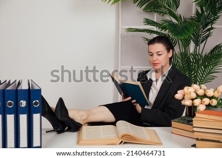woman in a business desk at work in an office