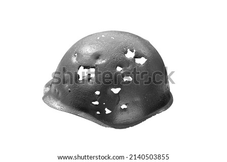 military helmet pierced by bullets and shrapnel isolated on white background, for military-themed project or design