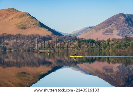 Derwentwater lake with clear reflection in Lake District, Cumbria. England Royalty-Free Stock Photo #2140516133