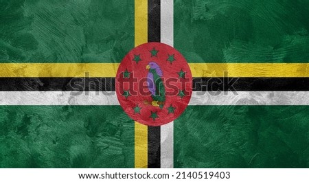 Textured photo of the flag of Dominica.