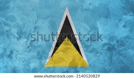 Textured photo of the flag of Saint Lucia.