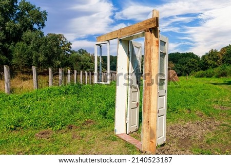 Doors and window from the house as a rustic symbol of hospitality. Background with copy space for text