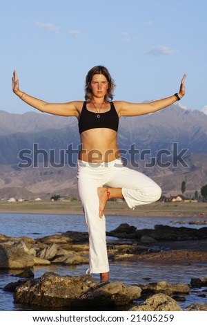 yoga exercise on beach