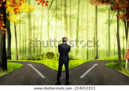 businessman has to decide which direction is better 