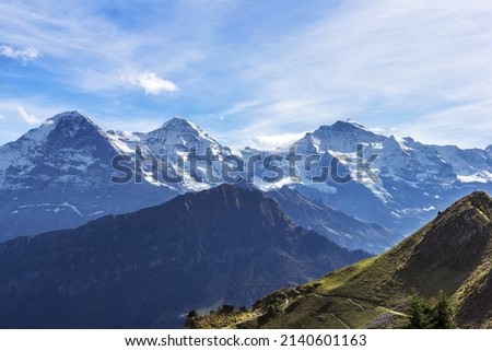 View from Schynige Platte on the famous Eiger, Mönch and Jungfrau mountain range in the Swiss alps. Royalty-Free Stock Photo #2140601163
