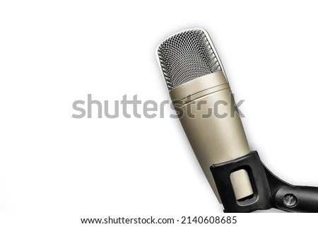 Professional studio condenser microphone for voice recording on white background.
