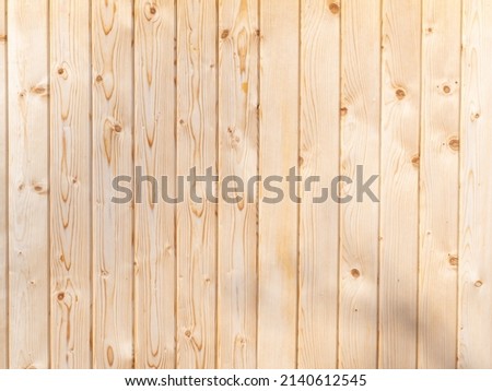 Light brown plank wood and has a natural pattern, wood wall texture background.
