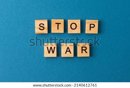 Stop war background. Phrase from wooden letters. Top view words. The phrases is laid out in wood letter. Motivation.
